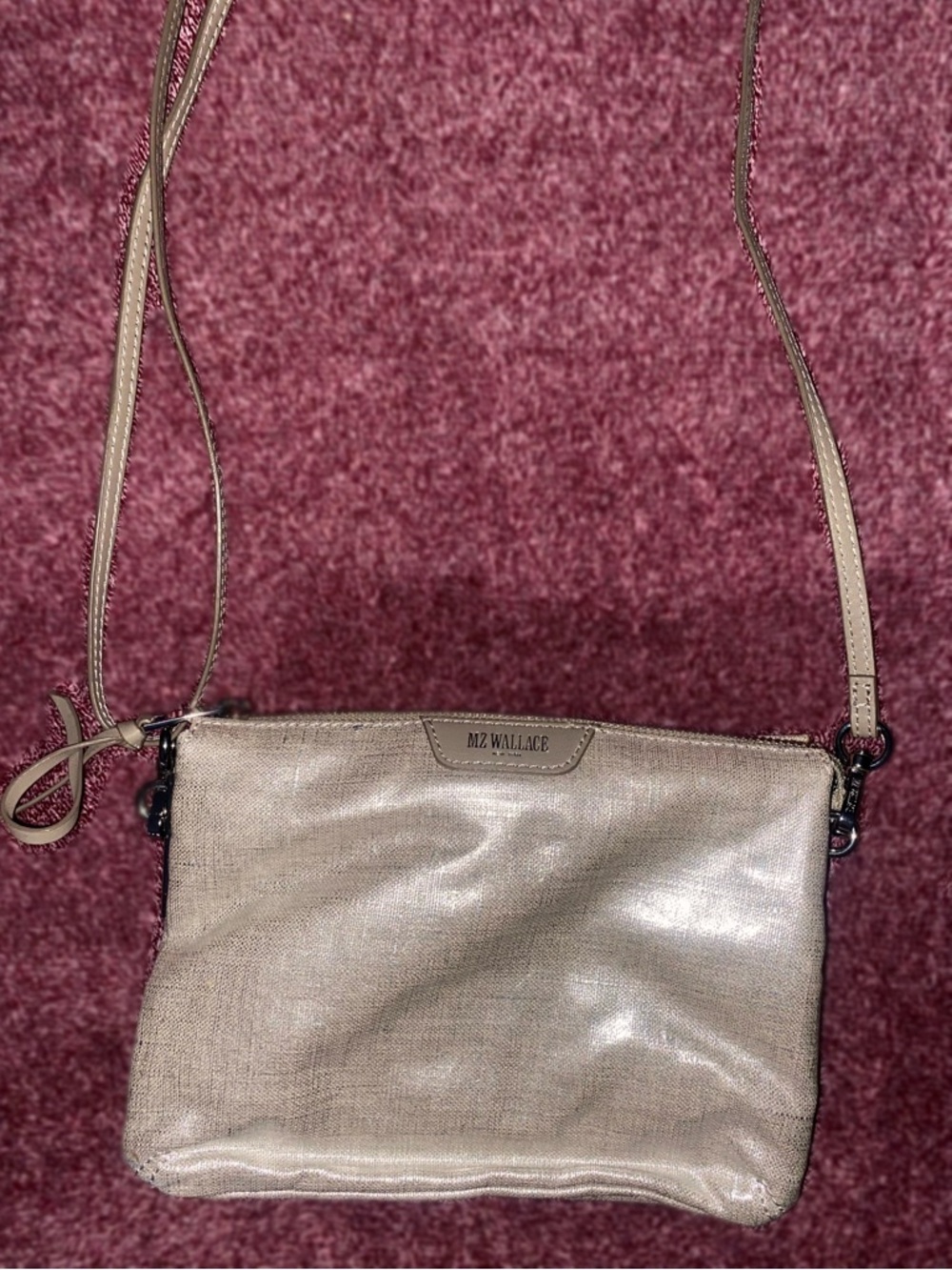 MZ Wallace New York crossbody bag in a metallic gold.